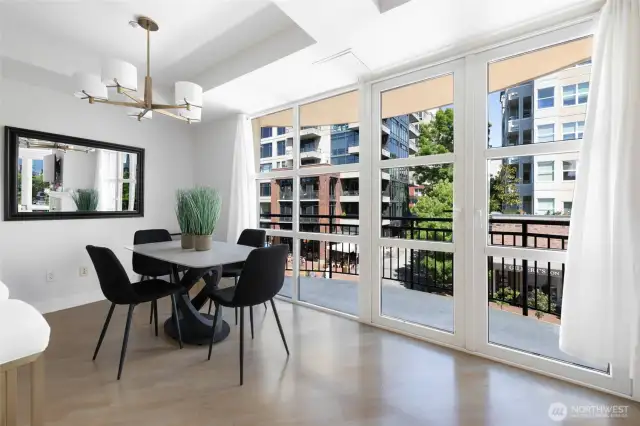 Dining room with owner's furniture prior to staging.