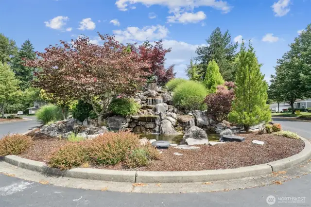 Sit on your porch and listen to the sounds of a landscaped waterfall.