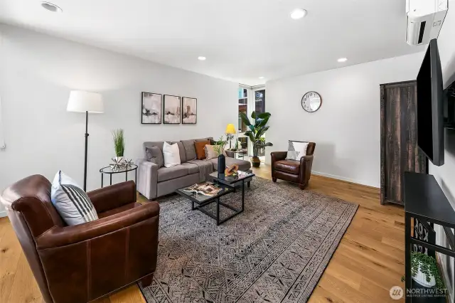 Flexible by design. This third bedroom doubles effortlessly as a media lounge, guest suite, or creative studio—complete with direct entry from the lower level for added privacy and independence.