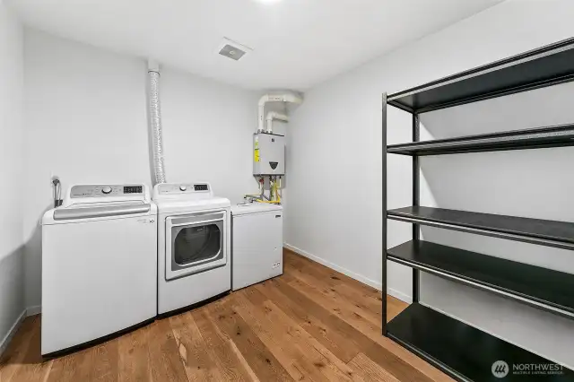 More than just laundry. With generous storage and room to move, this utility space supports the rhythms of daily life—whether folding, storing, or stashing gear between adventures.