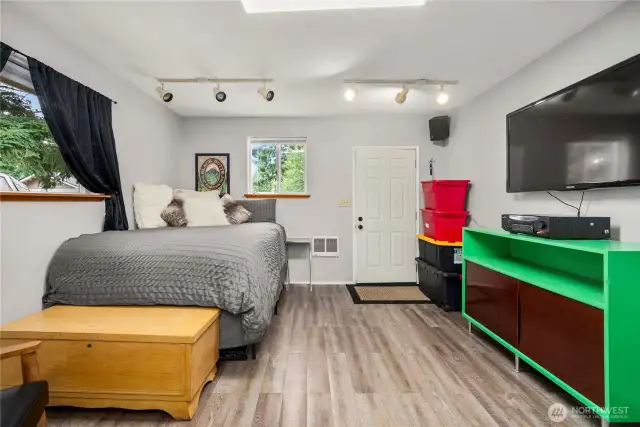 This well-maintained outbuilding is fully wired for electricity and features multiple lighting options, clean wall finishes, and wide-open usable floor space. The setup invites endless possibilities: convert it into a standalone office, hobby room, game room, or expand it into a permitted ADU with the addition of plumbing.