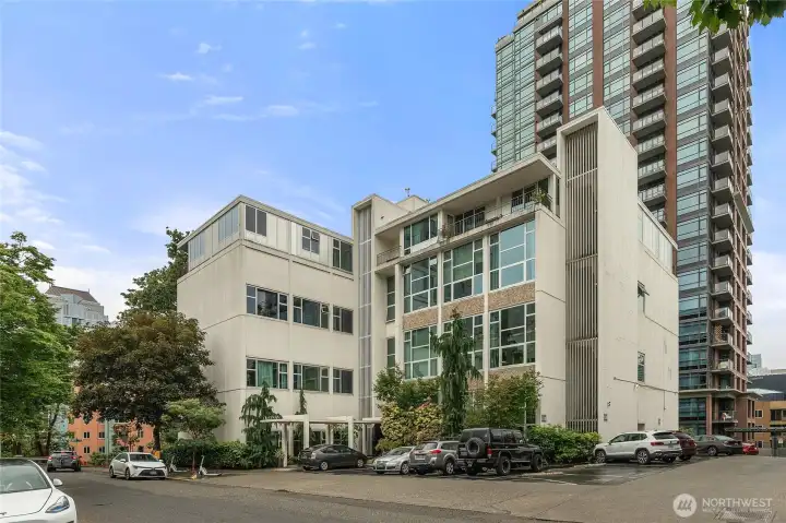 Deeded parking space (#13), rare for city living.
