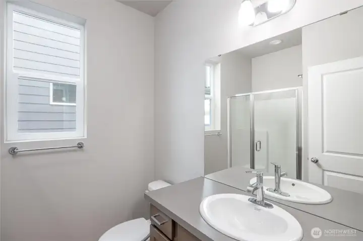 Main floor bath adjacent to Main floor bedroom
