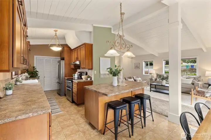 Stainless steel appliances include a double oven.