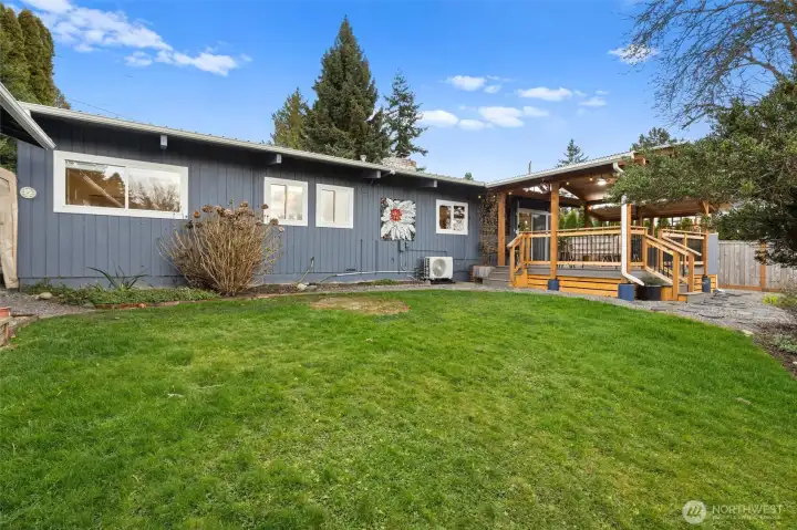 Expansive backyard connects you to the detached shop, gazebo with fireplace and the masterpiece: custom 20x20 covered deck with BBQ area.