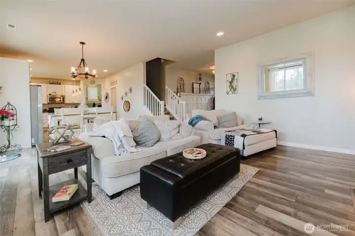 Family room with fireplace and tons of natural light