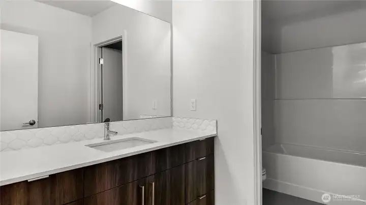 Second bathroom with bathtub