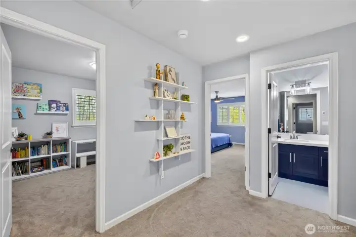 Open upper hallway flows from room to room.