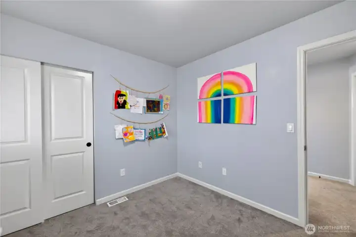 Bedroom 4 with sliding closet doors.