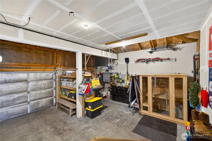 Garage with 3 bays and a sauna, tons of storage.