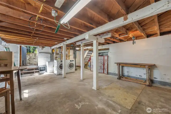 Basement can be accessed from outside or from steep stairs off the side porch.