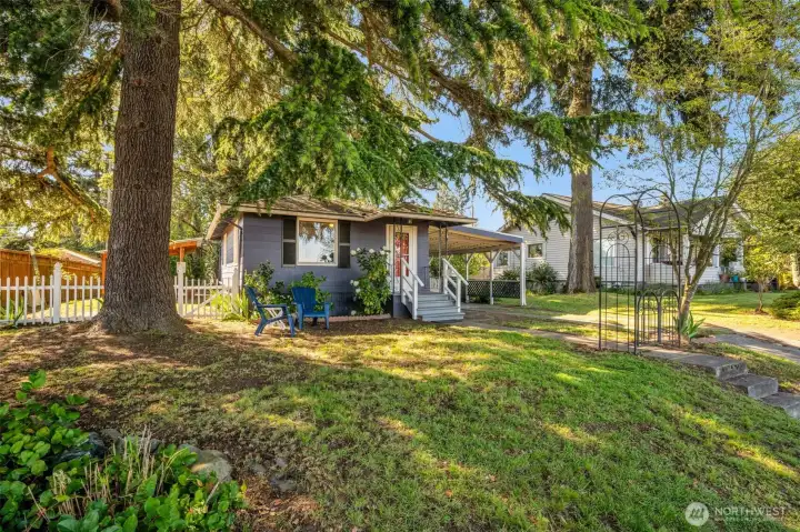 Side and back yards are fenced.