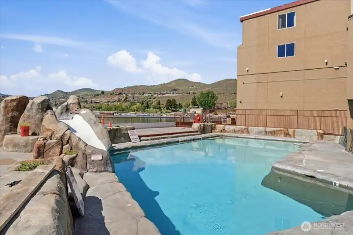 The lakefront pool and hot tub create a true resort atmosphere right outside your door.