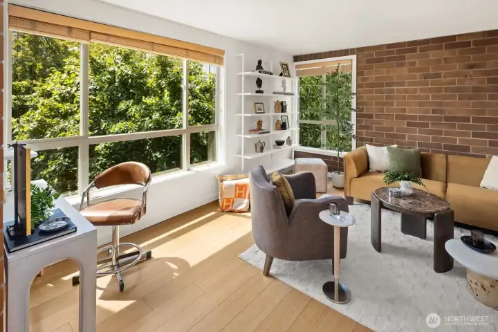Bamboo floors, timeless brick accents, and walls filled with glass give this home a warm, architectural character that's hard to find.