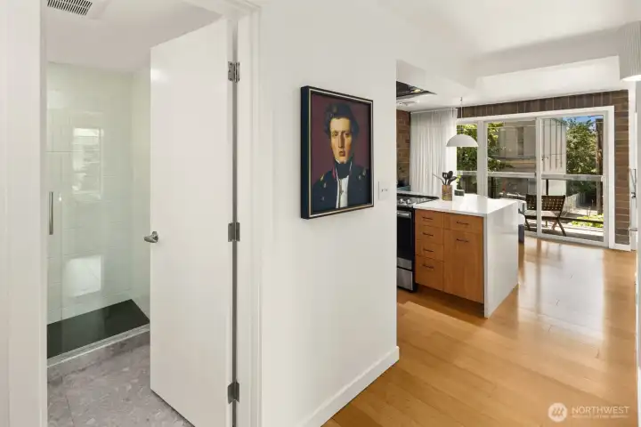 Thoughtful updates create a cohesive flow from room to room, blending modern finishes with the building's enduring mid-century character.
