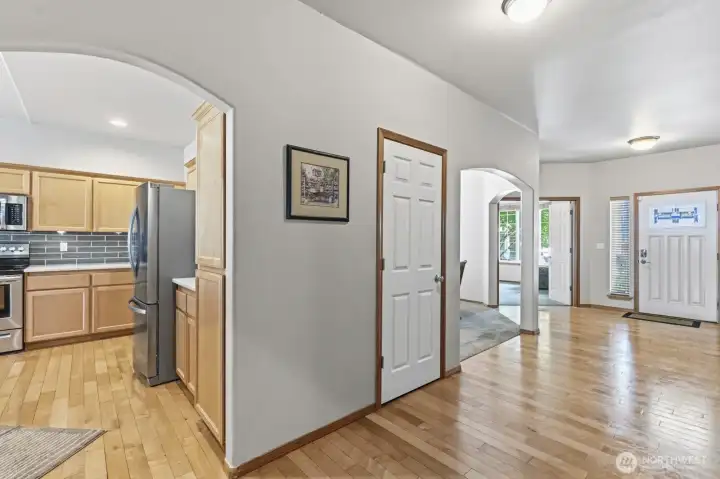 Beautiful entrance with wide hallways and arched doorways