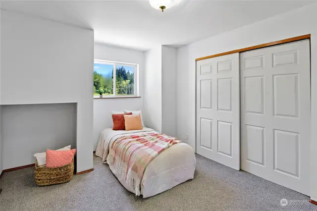 Another bedroom on the middle level - again with that gorgeous view and neat architectural details!