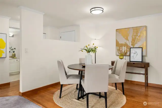 The dining nook and kitchen boast updated laminate hardwood floors.