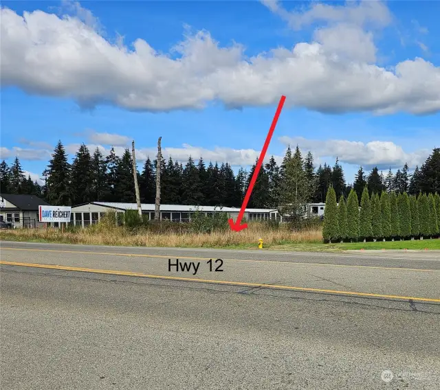 Hwy 12 frontage. Note the fire hydrant on the corner.