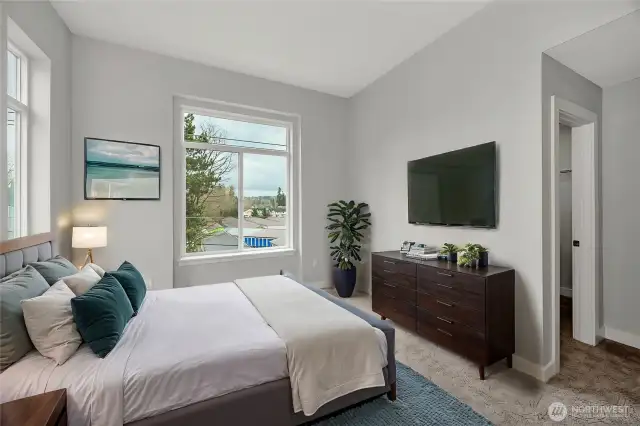 Bright and spacious primary bedroom - high ceilings (virtually staged)