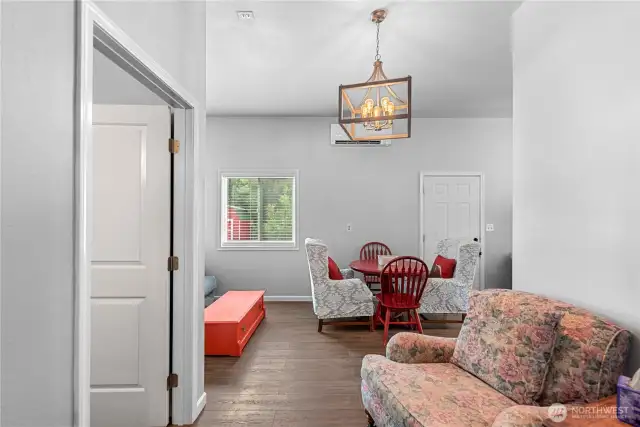 Garage bonus area, living room, and dining area