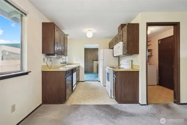 Galley kitchen with Utility to the right.
