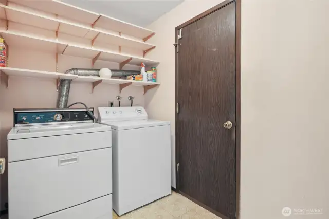 Utility Room with Storage Shelves.