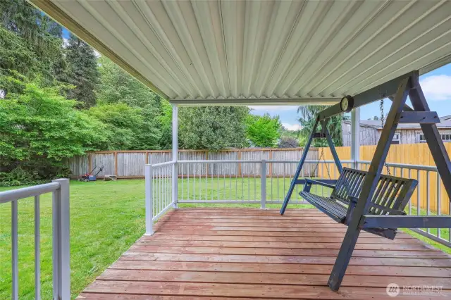 Covered back deck.  Vinyl for easy cleaning!