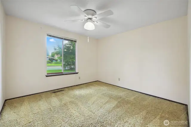 Primary bedroom on the left faces the street side of the lot.