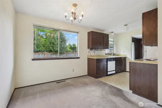 Eat In Kitchen with a view of the backyard.