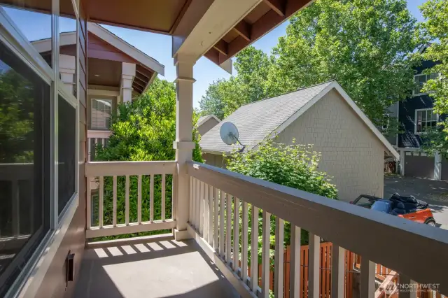 Enjoy a peaceful morning coffee or evening unwind on the covered balcony off the bedroom.