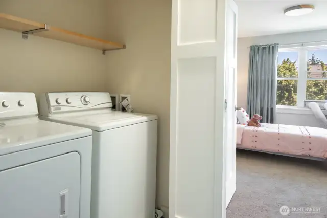 Convenient upstairs laundry space located near the bedrooms for easy access.
