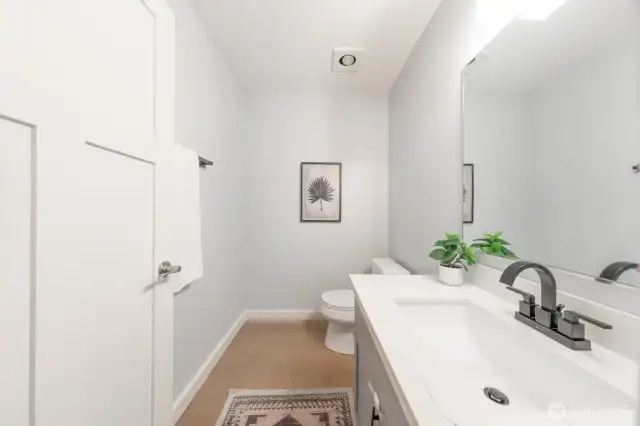 Convenient half bath on the main floor.