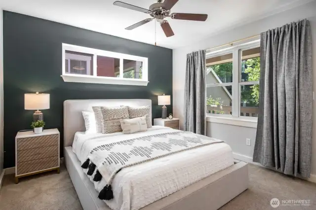 Spacious and light-filled primary suite.