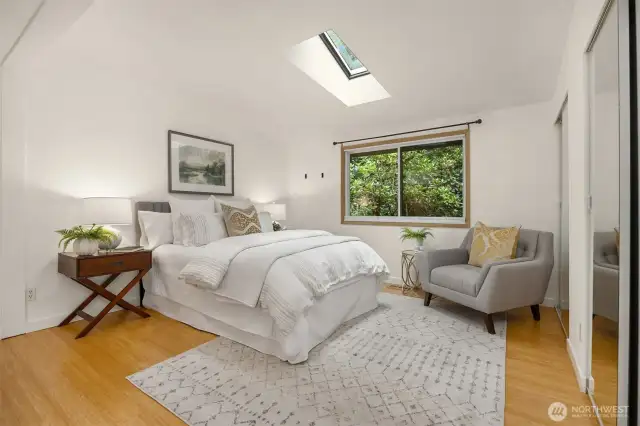 Primary with wall closets the length of the room.