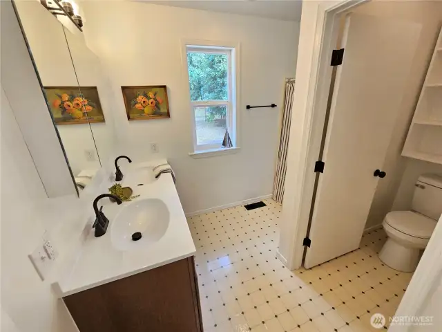 Bathroom #2 upstairs with a double vanity.