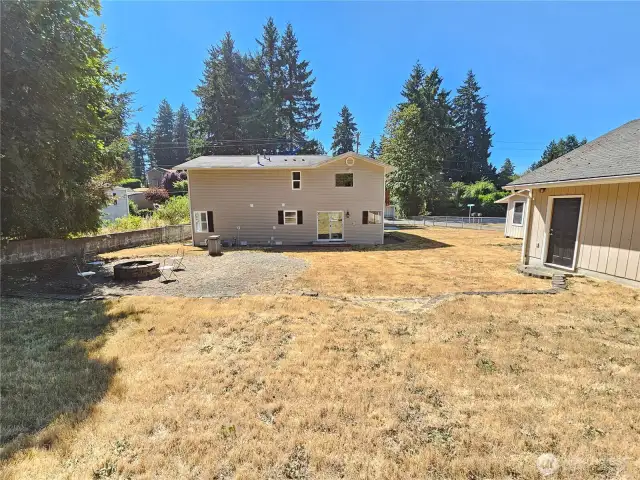 Large Backyard with a detached garage.