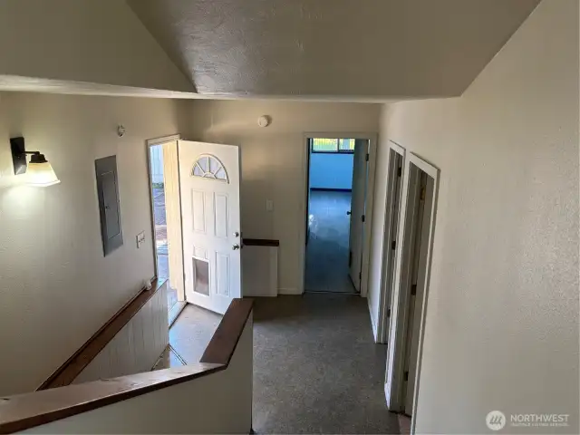 Stairway to the primary bedroom and downstairs
