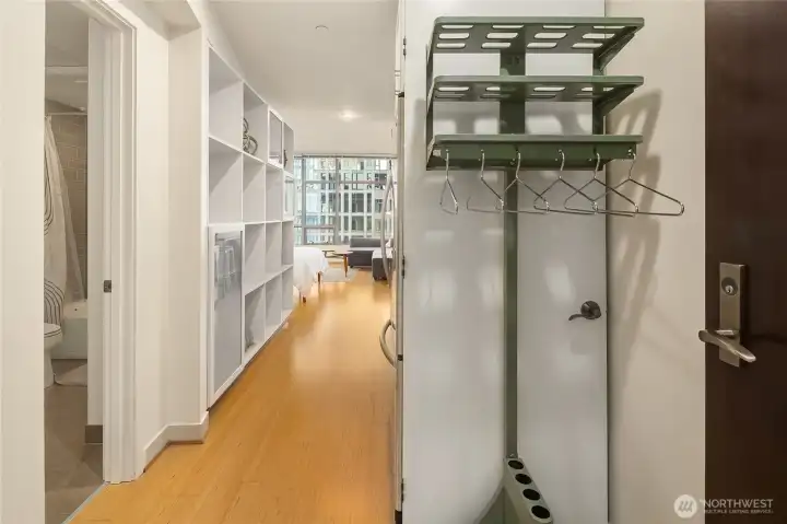 Entry with coat closet and space for seating or, as the current owner has additional hanging space. Unit comes fully furnished