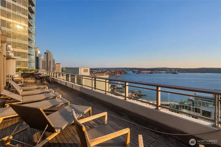Large sky terrace with several distinct spaces to relax, BBQ, and more