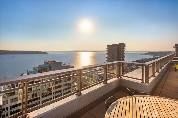 Large sky terrace with several distinct spaces to relax, BBQ, and more