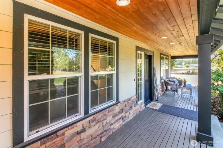 Fully covered front porch and composite decking.