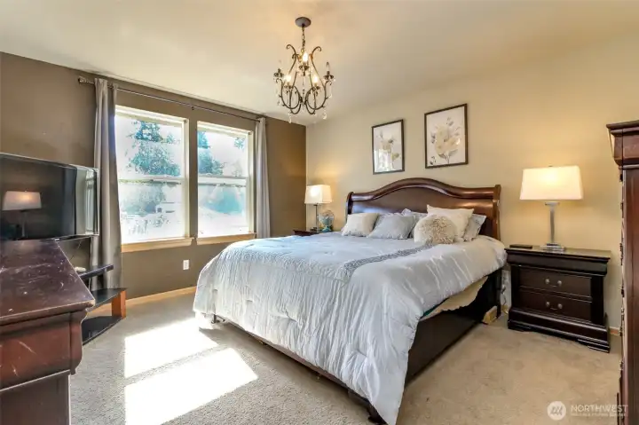 Primary bedroom is on the main floor. There is a walk in closet and 5 piece ensuite.