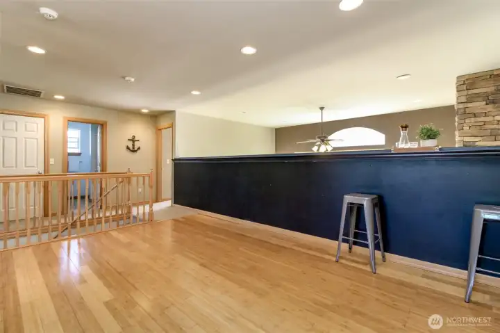 Loft half wall with counter space. This overlooks the family room.
