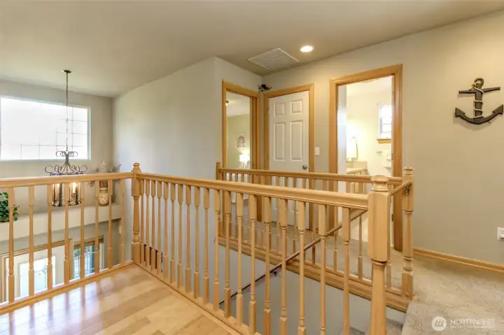 The open door in the corner is the second extra bedroom. The third bedroom is to the right of this pictiure.