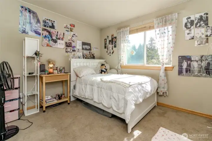 This second extra bedroom faces the backyard. The full bathroom is in between these two bedrooms. The loft area is across from the bedrooms and bathrooms.