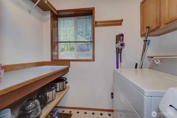 Laundry/utility room with storage and folding table (yay!)