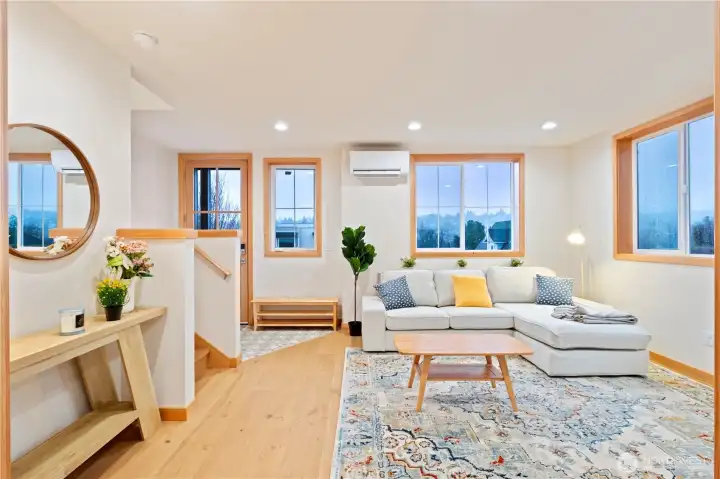 Enter on the main level to find a bright and spacious living area.