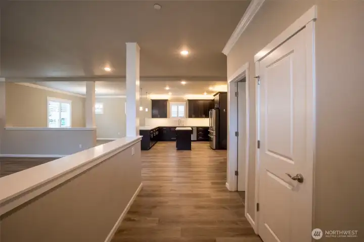 Enter and immediately you're at the heart of the home where life happens.