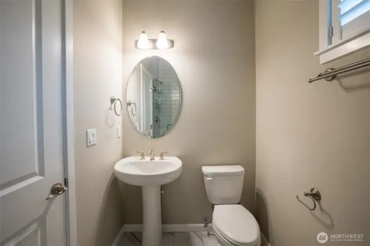 Guests? Multi-generational living? This bathroom on the main opens options.